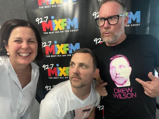 Drew Wilson in a T-shirt with the Mix FM crew