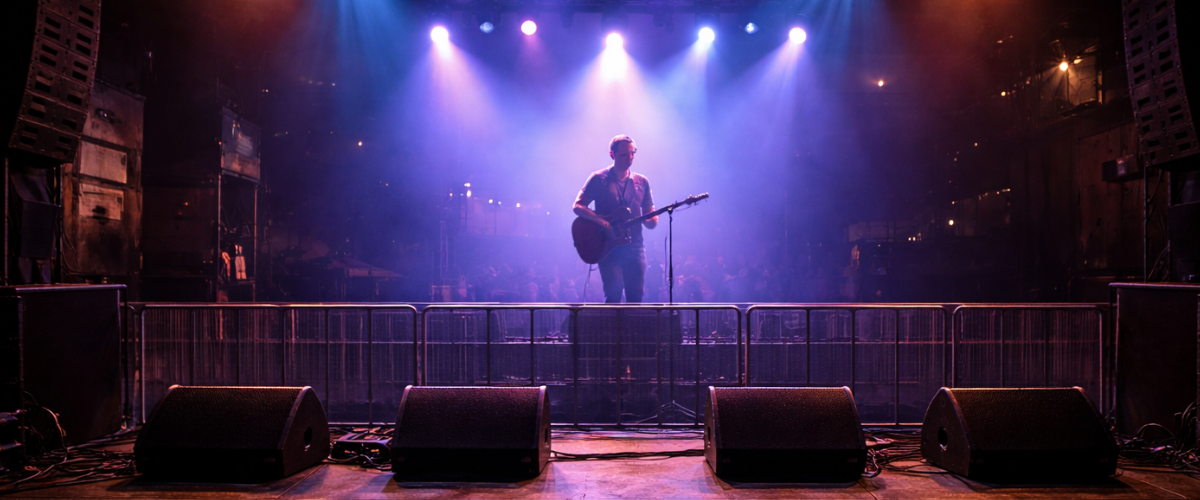  a musician plays on a local stage 
