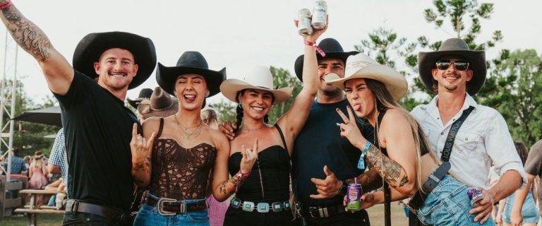Country music fans in cowboy hats at CMC Rocks QLD