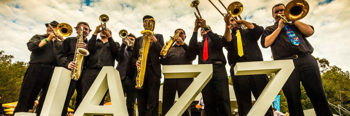 A lineup of brass jazz musicians