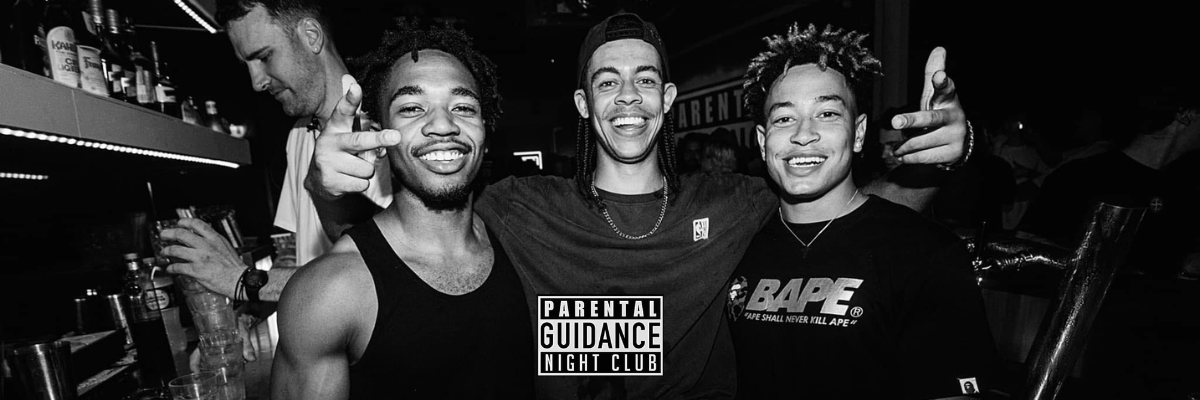 Photo of partygoers with a bartender at Parental Guidance.