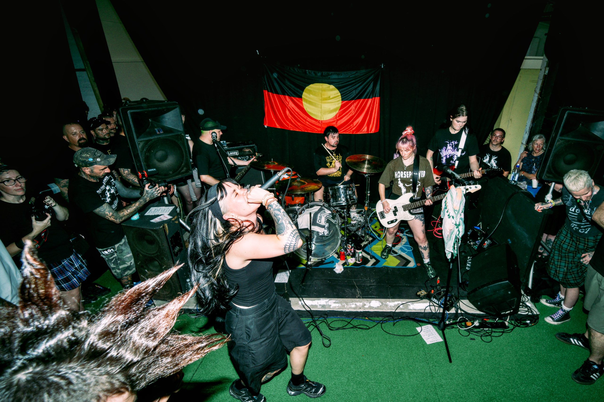 Photo of a band playing at Black Market Day in Nambour’s Old Ambo Gallery ramp space.