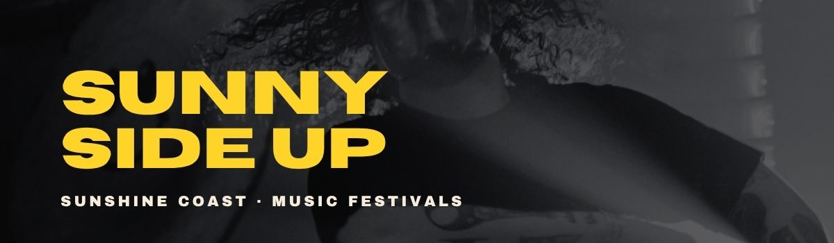 Sunny Side Up banner featuring a dark festival photo with yellow text.