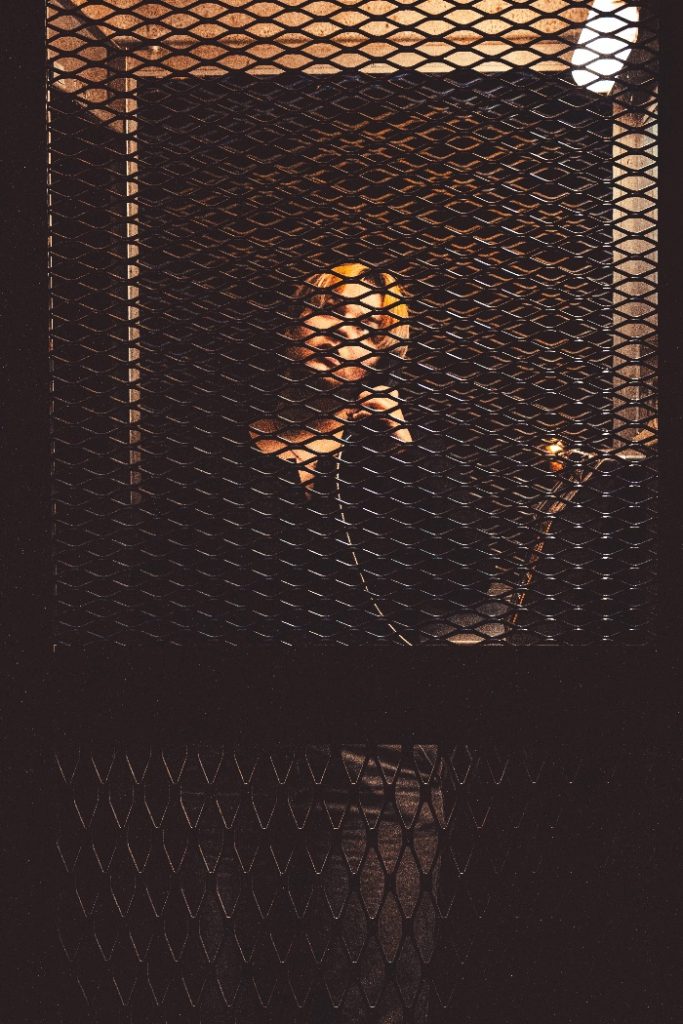 Elke Louie in a telephone box