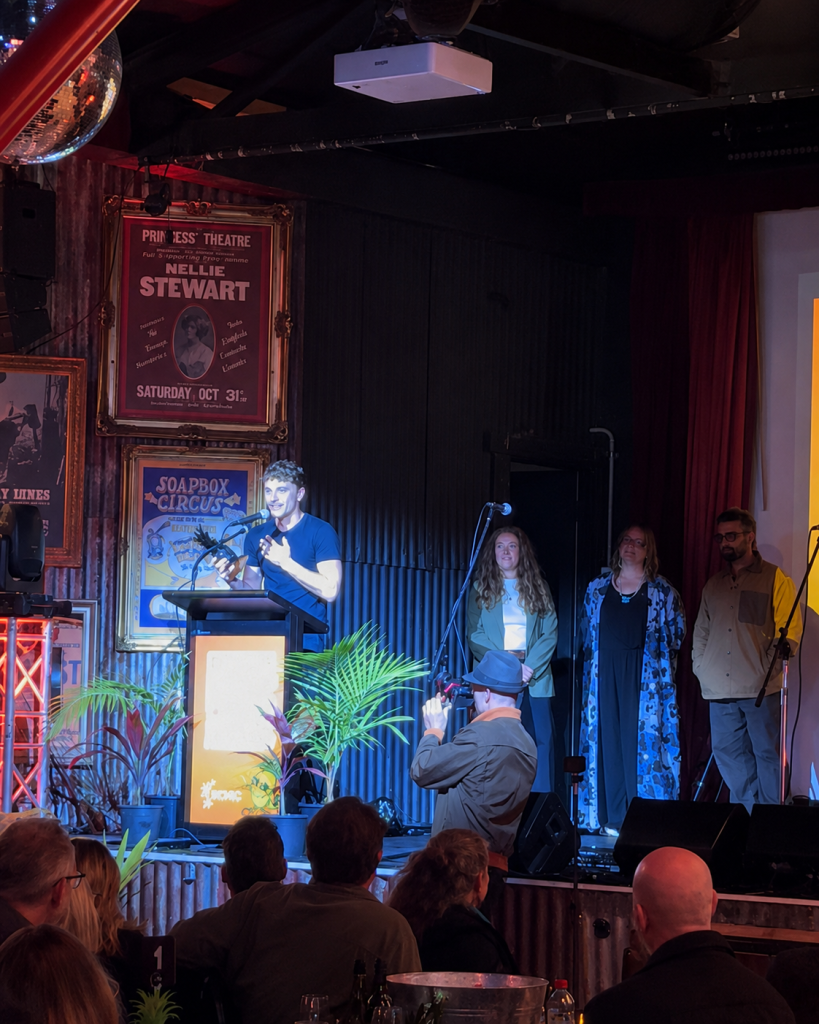 Che Burns accepting his award