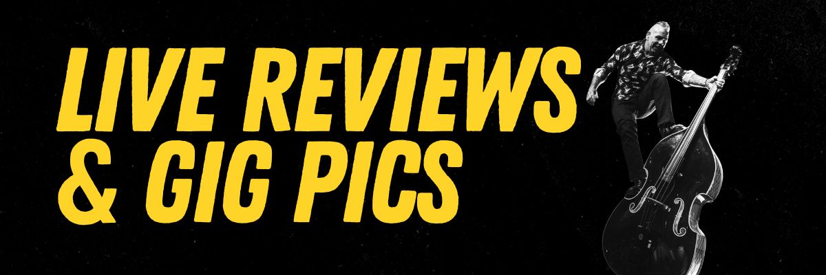 Live Reviews and Gig Pics banner featuring The Living End bassist in black and white with yellow text.