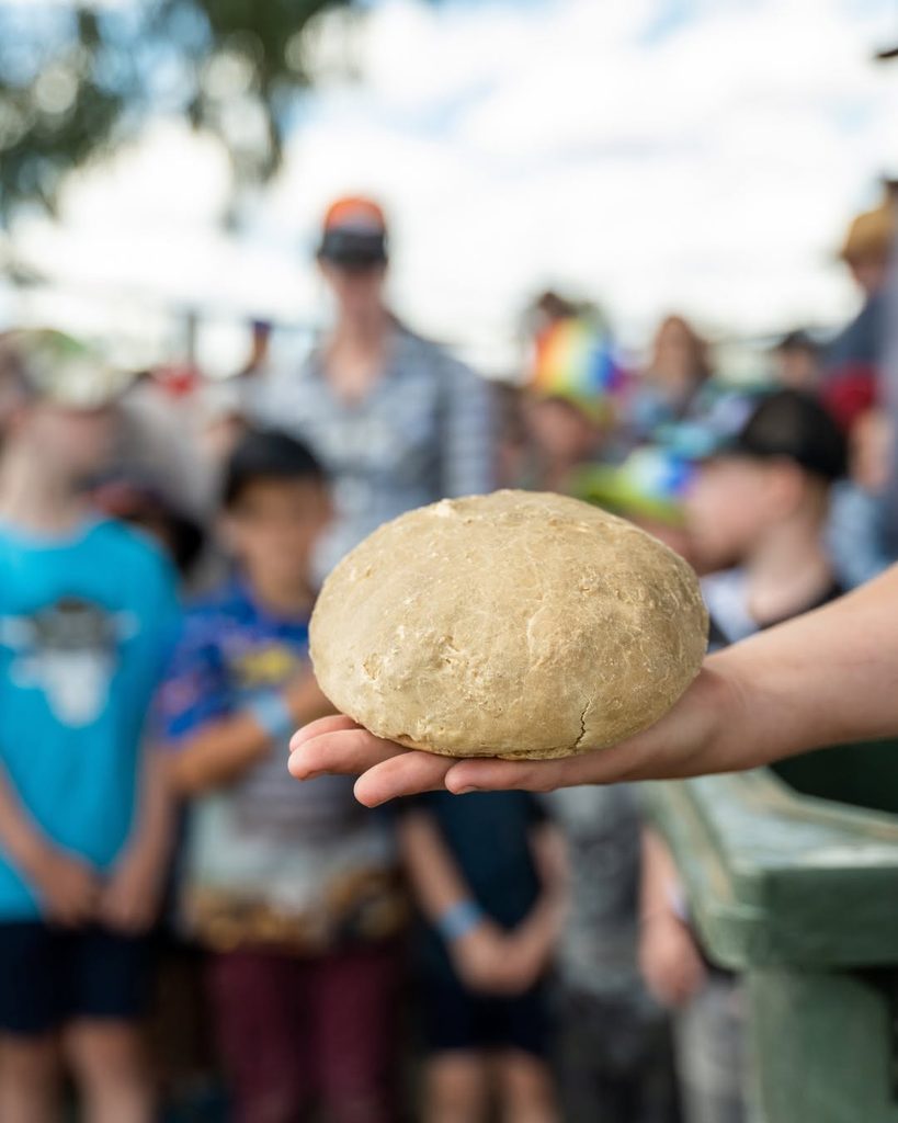 Damper throwing at the Australian Camp Oven Festival in Millmerran