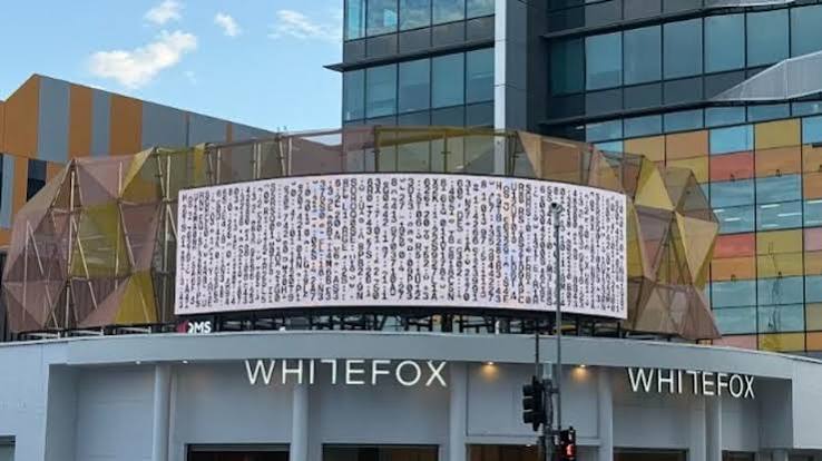 Cryptic Powderfinger billboard on James Street in Brisbane