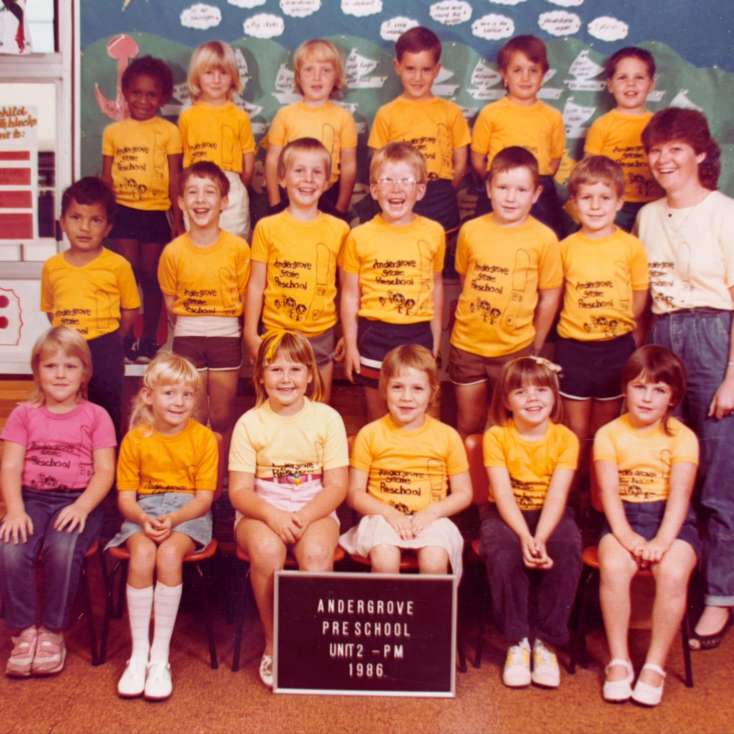 Penny as a child wearing a yellow T-shirt she designed for her school group at Andergrove State School in Mackay.